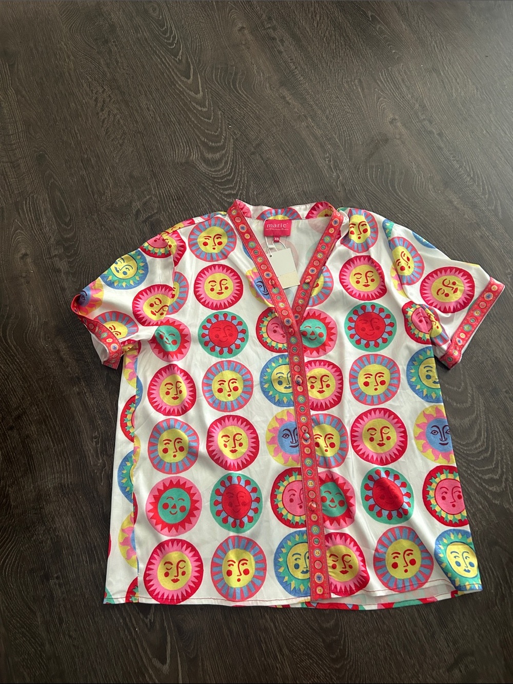 Marie by Victoria Sunn Multicolor Sun Motif V-Neck Blouse with Pink Trim